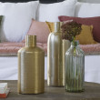 The MOUSSE vase is a charming bottle-shaped vase made of matte glass